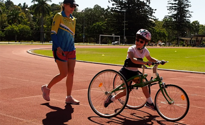 Dr Sarah Reedman from UQ’s Cerebral Palsy and Rehabilitation Research Centre with Caitlin Mitchell participating in frame running training at UQ.